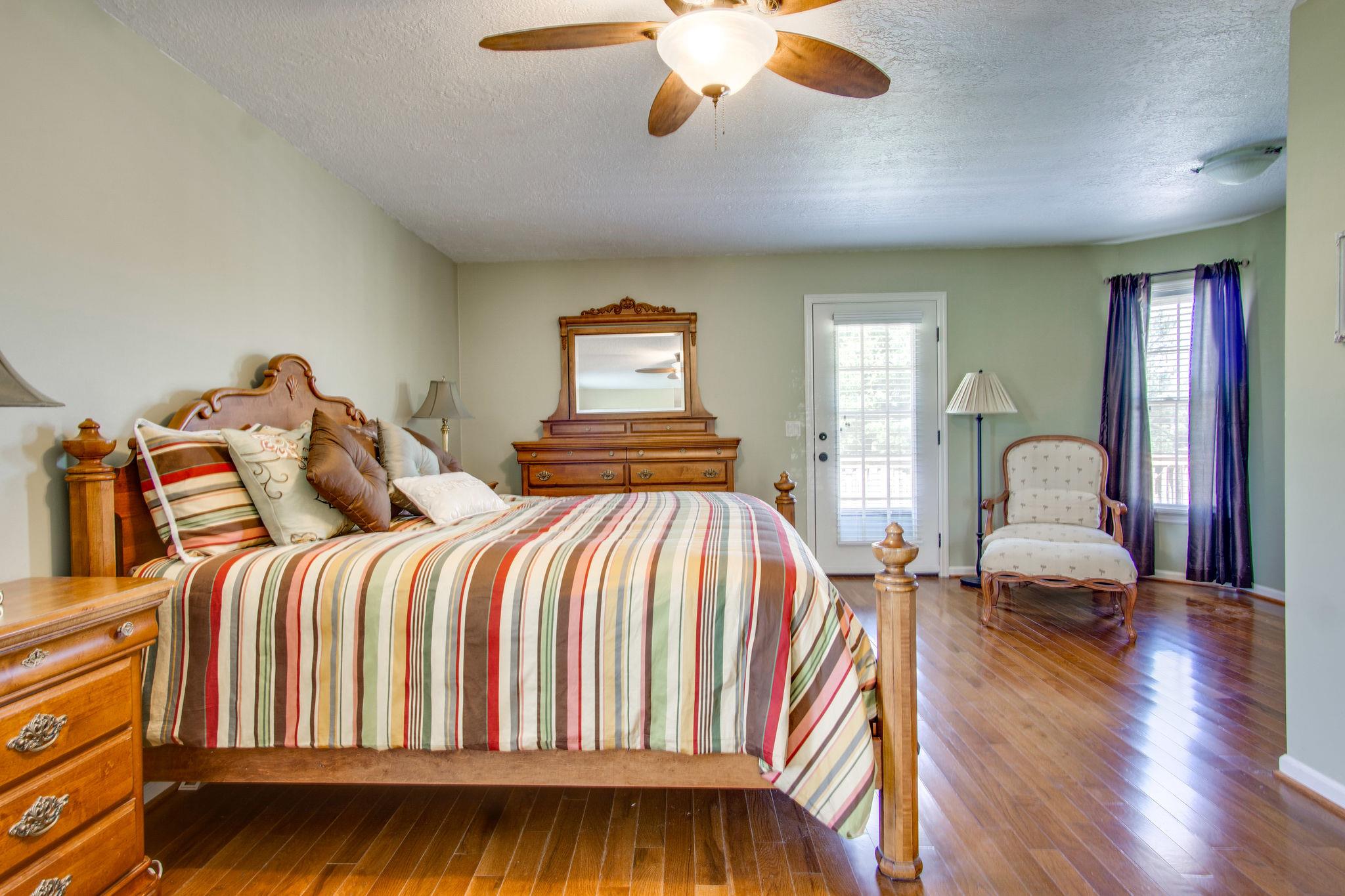 1001 Tom Osborne Road Columbia, TN 38401 - Photo 11 of 30 Huge master bedroom. The hardwood floors extend to this room as well.