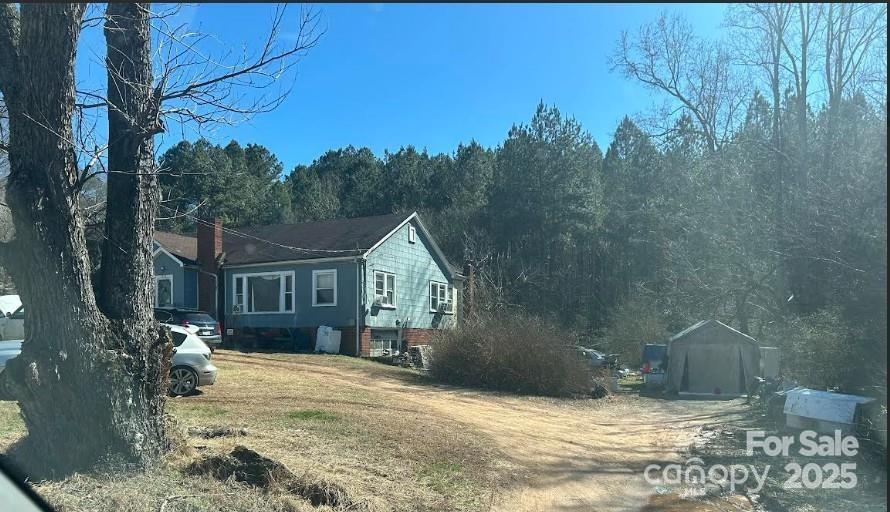1608 East Main Street Locust, NC 28097 - Photo 10 of 10 a view of a house with a yard