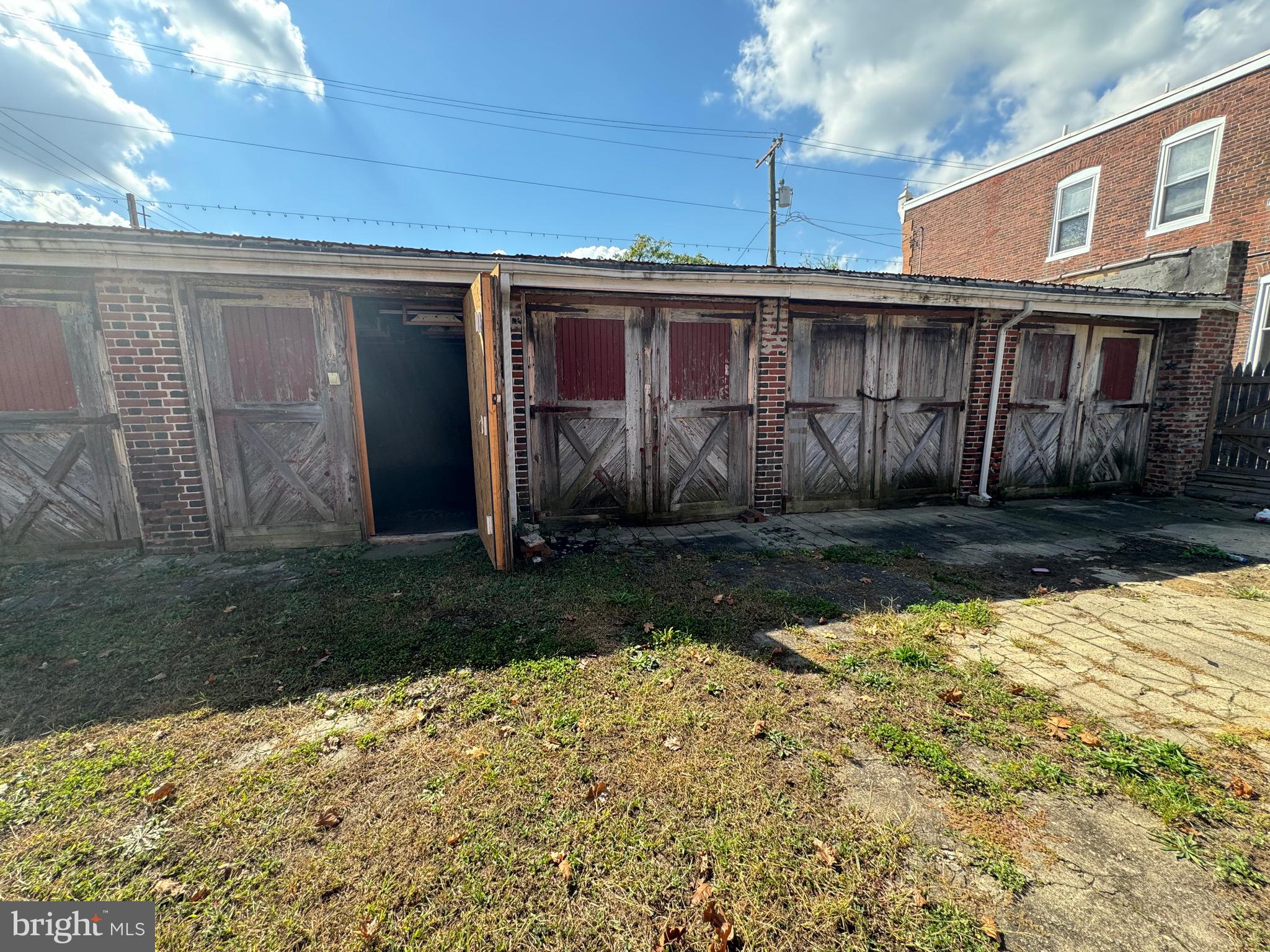 203 Slocum Street, Unit A Philadelphia, PA 19119 - Photo 2 of 9 a view of a house with a yard