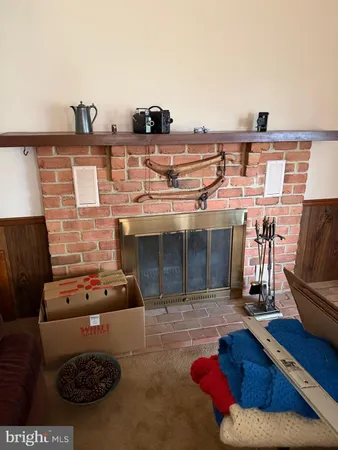 a view of a livingroom with furniture and tv