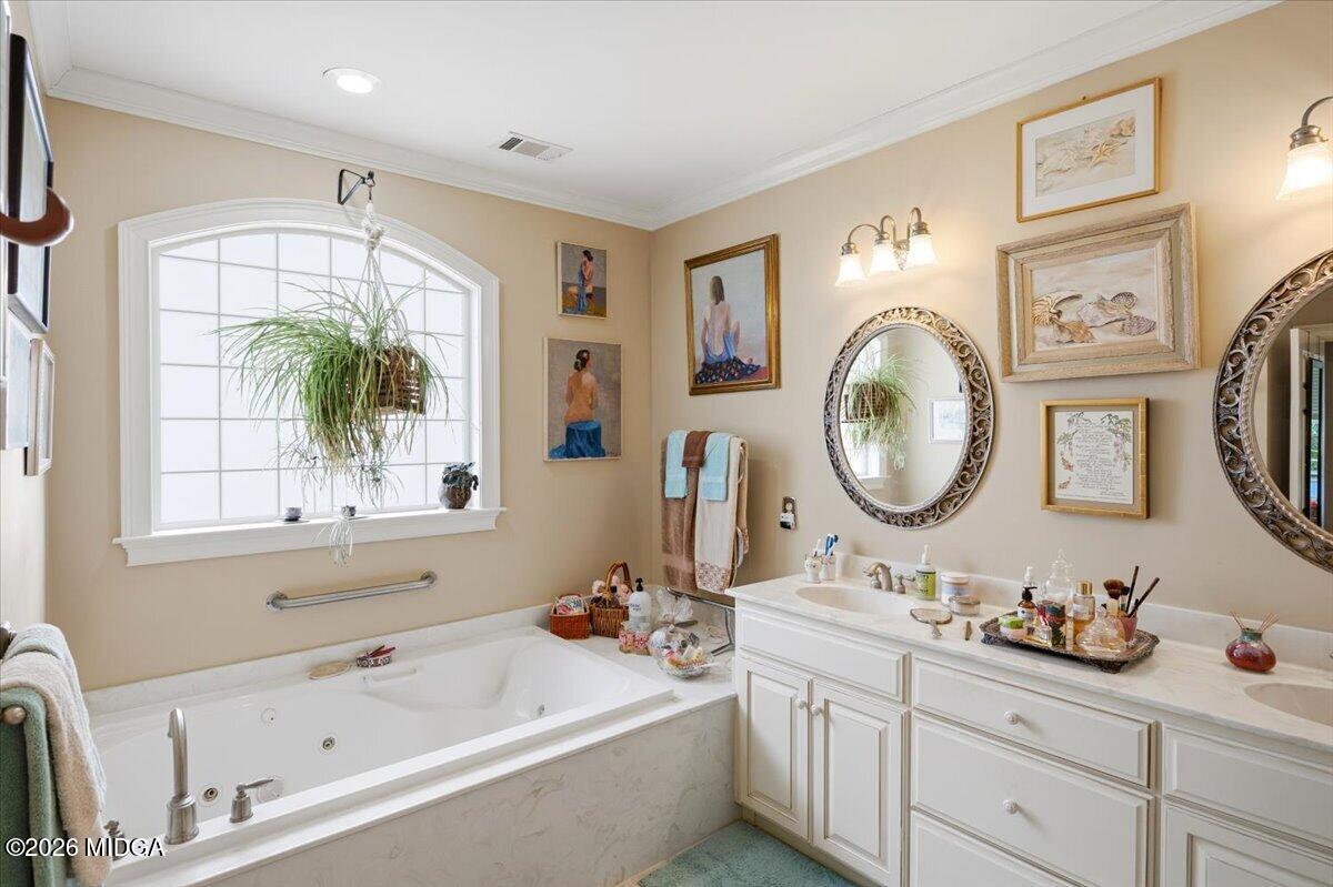 210 Oberon Place Macon, GA 31210 - Photo 20 of 31 a bathroom with a tub sink and mirror