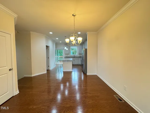 a view of a room with a chandelier