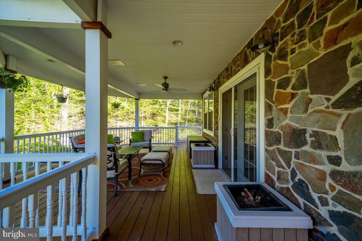 972 Smithbridge Road Glen Mills, PA 19342 - Photo 15 of 75 a view of a city from a dining room with furniture and floor to ceiling window