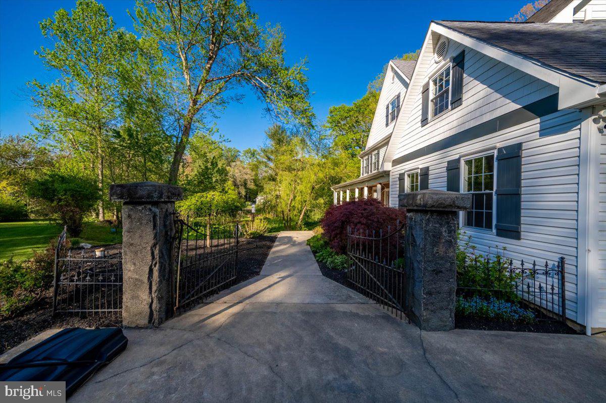 972 Smithbridge Road Glen Mills, PA 19342 - Photo 22 of 75 a view of a house with a yard