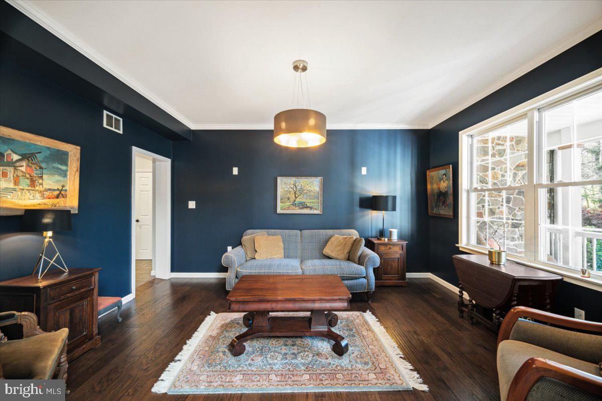 972 Smithbridge Road Glen Mills, PA 19342 - Photo 31 of 75 a living room with furniture a rug and a large window