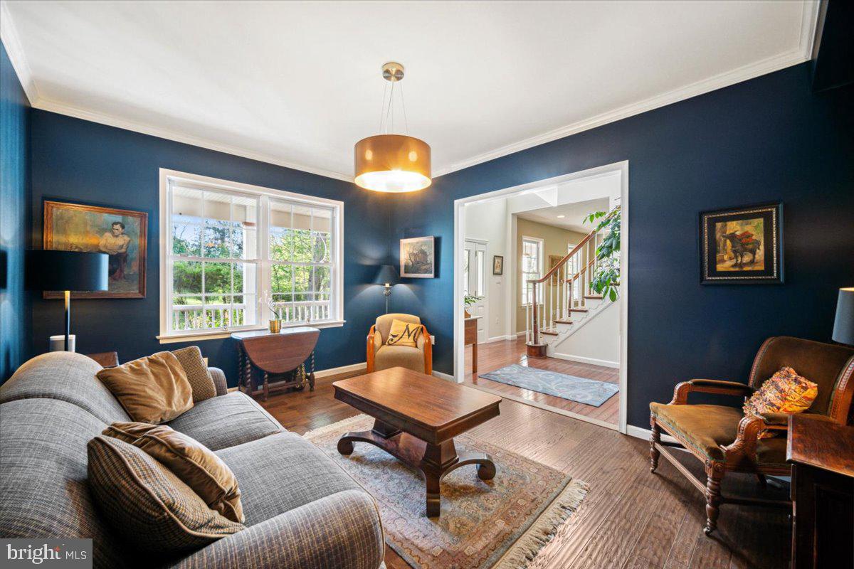 972 Smithbridge Road Glen Mills, PA 19342 - Photo 32 of 75 a living room with furniture a rug and a large window