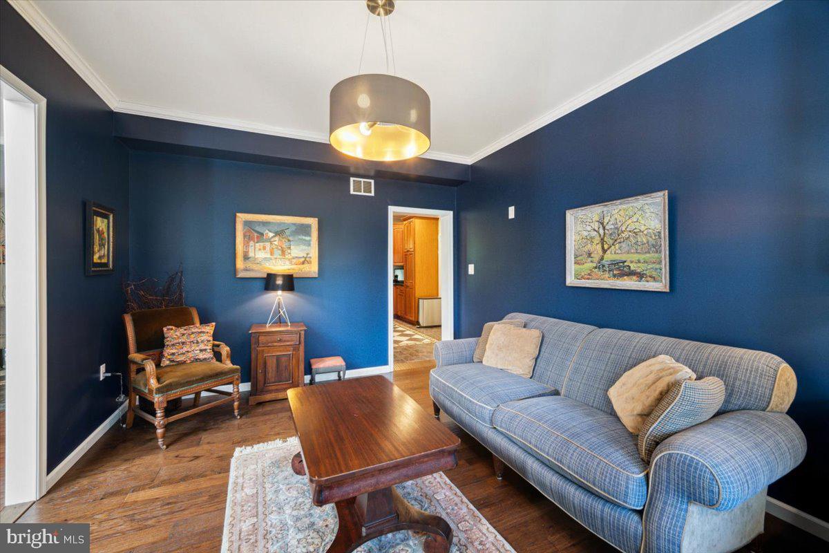 972 Smithbridge Road Glen Mills, PA 19342 - Photo 33 of 75 a living room with furniture and a wooden floor