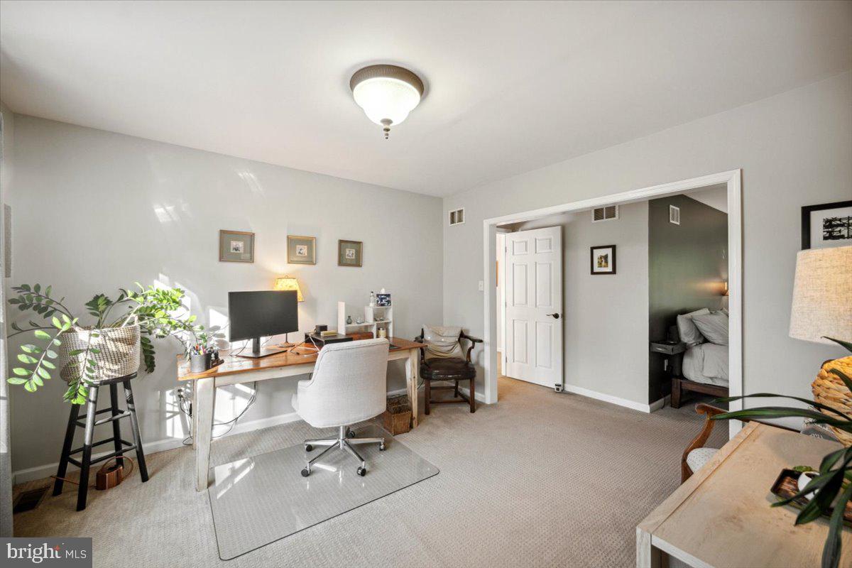 972 Smithbridge Road Glen Mills, PA 19342 - Photo 50 of 75 a view of a livingroom with workspace and a couch