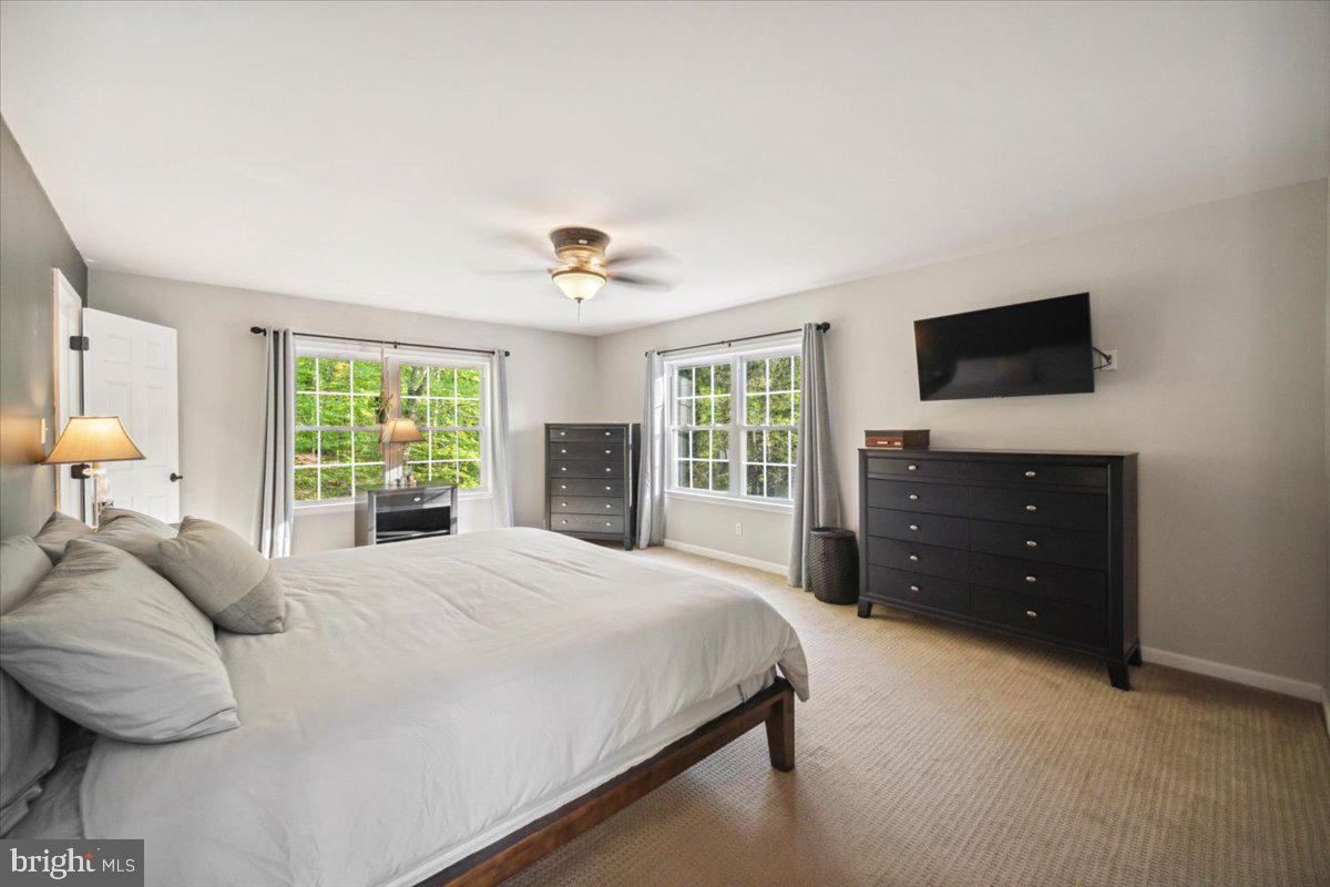 972 Smithbridge Road Glen Mills, PA 19342 - Photo 54 of 75 a bedroom with a bed and a television