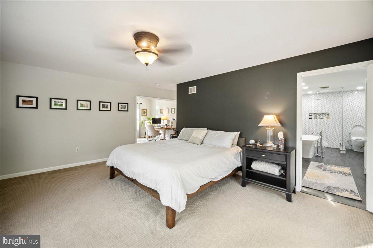 972 Smithbridge Road Glen Mills, PA 19342 - Photo 55 of 75 a bedroom with a bed and window