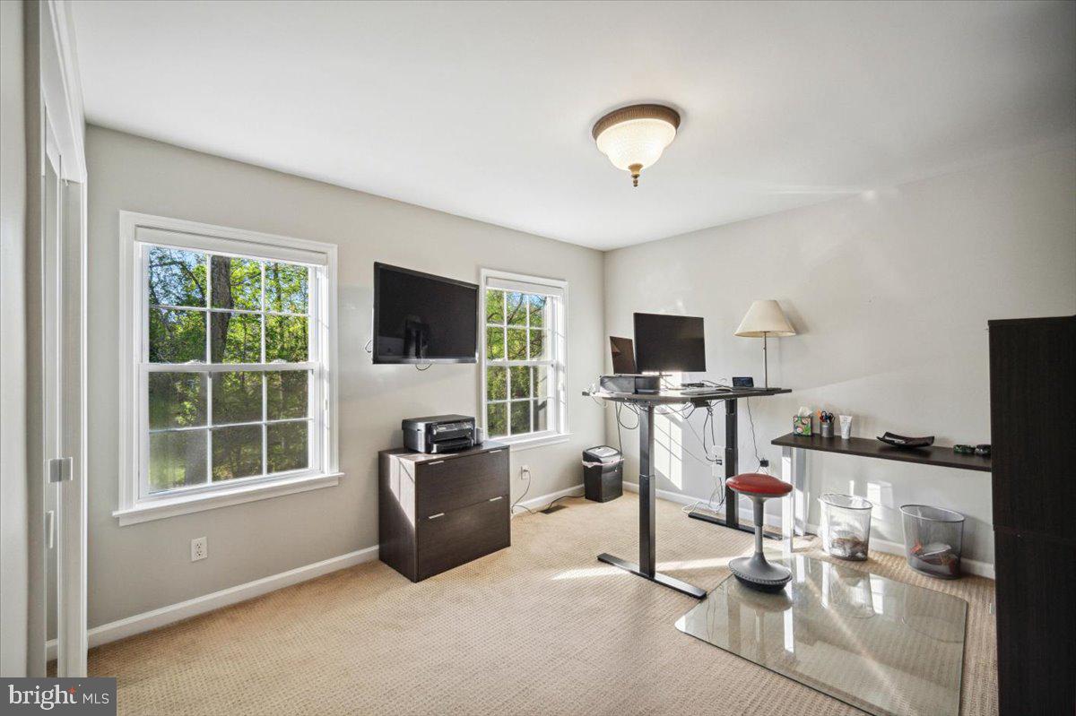972 Smithbridge Road Glen Mills, PA 19342 - Photo 59 of 75 a living room with furniture and a flat screen tv