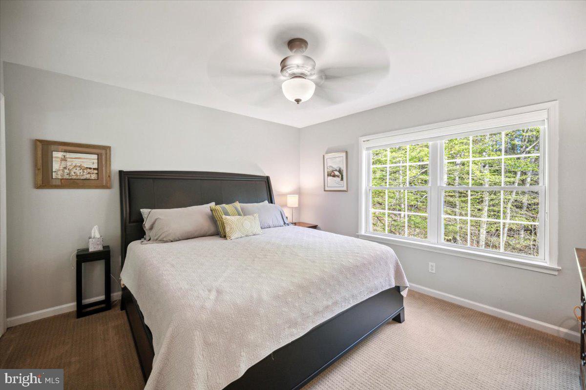 972 Smithbridge Road Glen Mills, PA 19342 - Photo 62 of 75 a bedroom with a bed and window