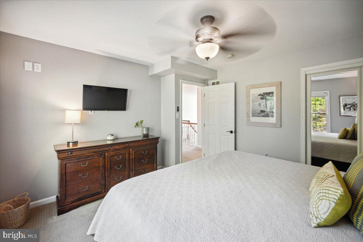 972 Smithbridge Road Glen Mills, PA 19342 - Photo 63 of 75 a bedroom with a bed and a flat screen tv