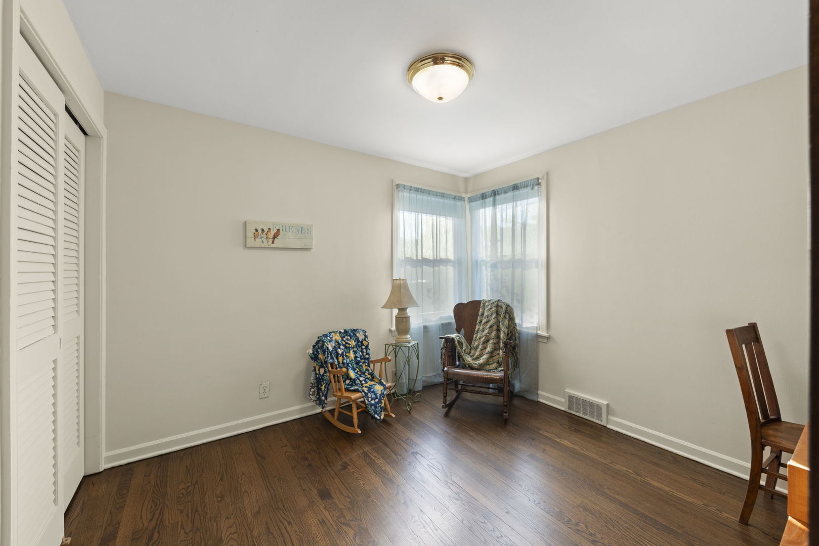1913 Birch Road Homewood, IL 60430 - Photo 17 of 22 a view of a workspace with furniture and a window