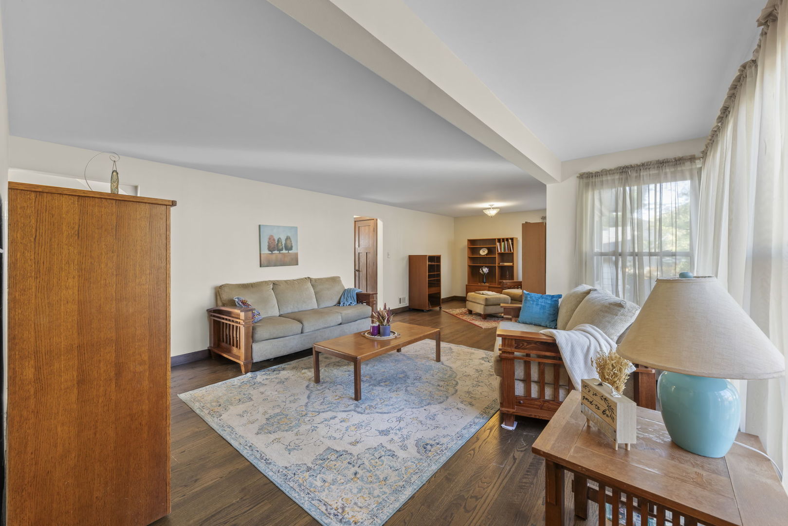 1913 Birch Road Homewood, IL 60430 - Photo 4 of 22 a living room with furniture and a rug