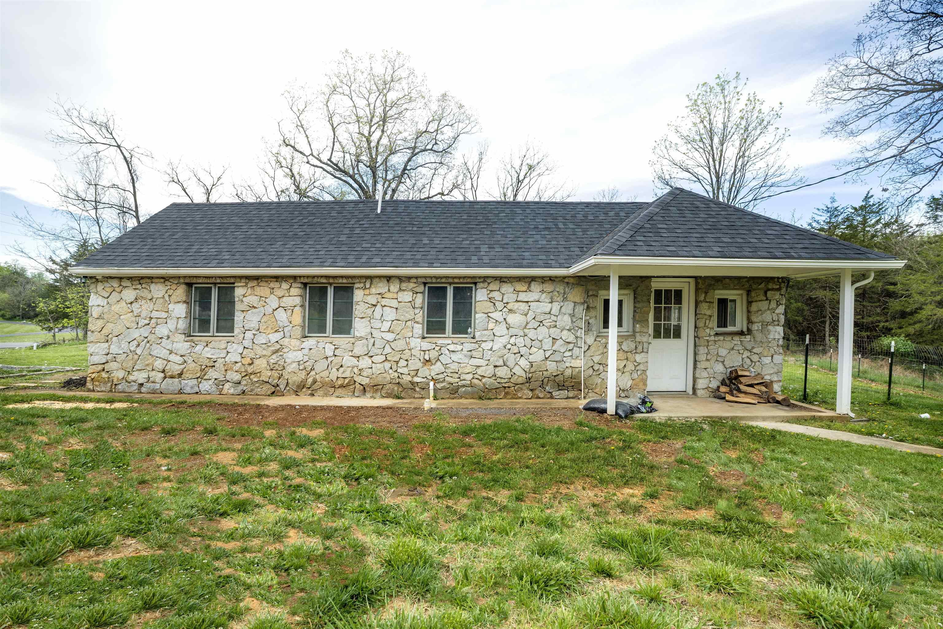 1641 Smithland Road Harrisonburg, VA 22802 - Photo 31 of 44 a front view of a house with a garden and yard