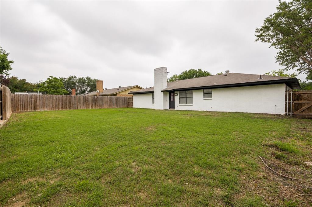 2908 Legend Road Arlington, TX 76014 - Photo 27 of 29 Spacious backyard with plenty of room to relax, entertain, garden, or create your ideal outdoor space!