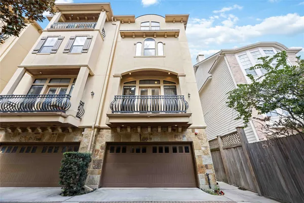 a front view of a house with a balcony