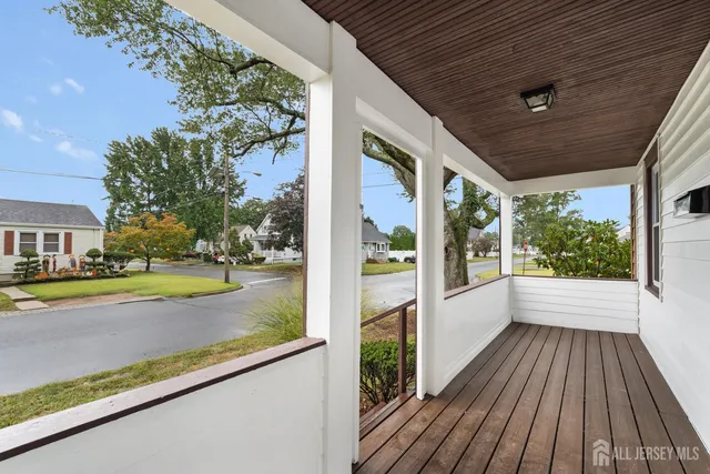 a view of a porch and garden