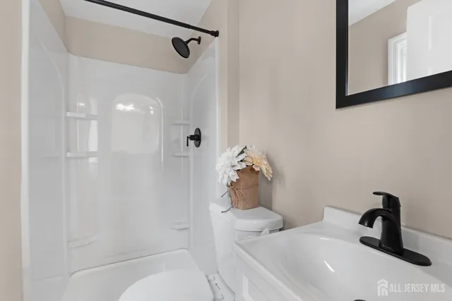 a bathroom with a sink and a toilet