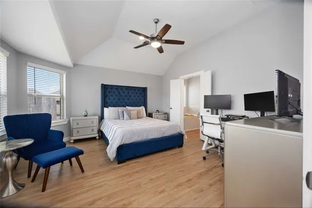 a bedroom with furniture and a bed