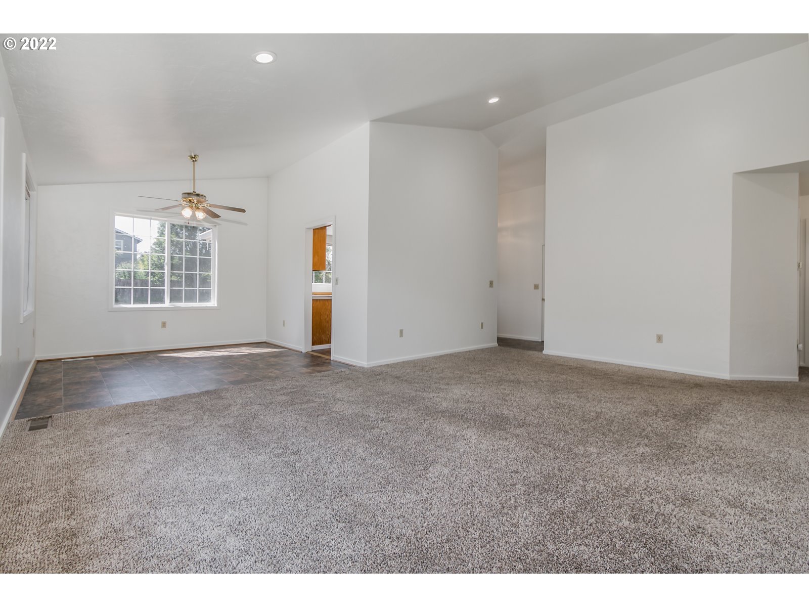 2491 Mangan Street Eugene, OR 97402 - Photo 14 of 20 a view of an empty room with a window