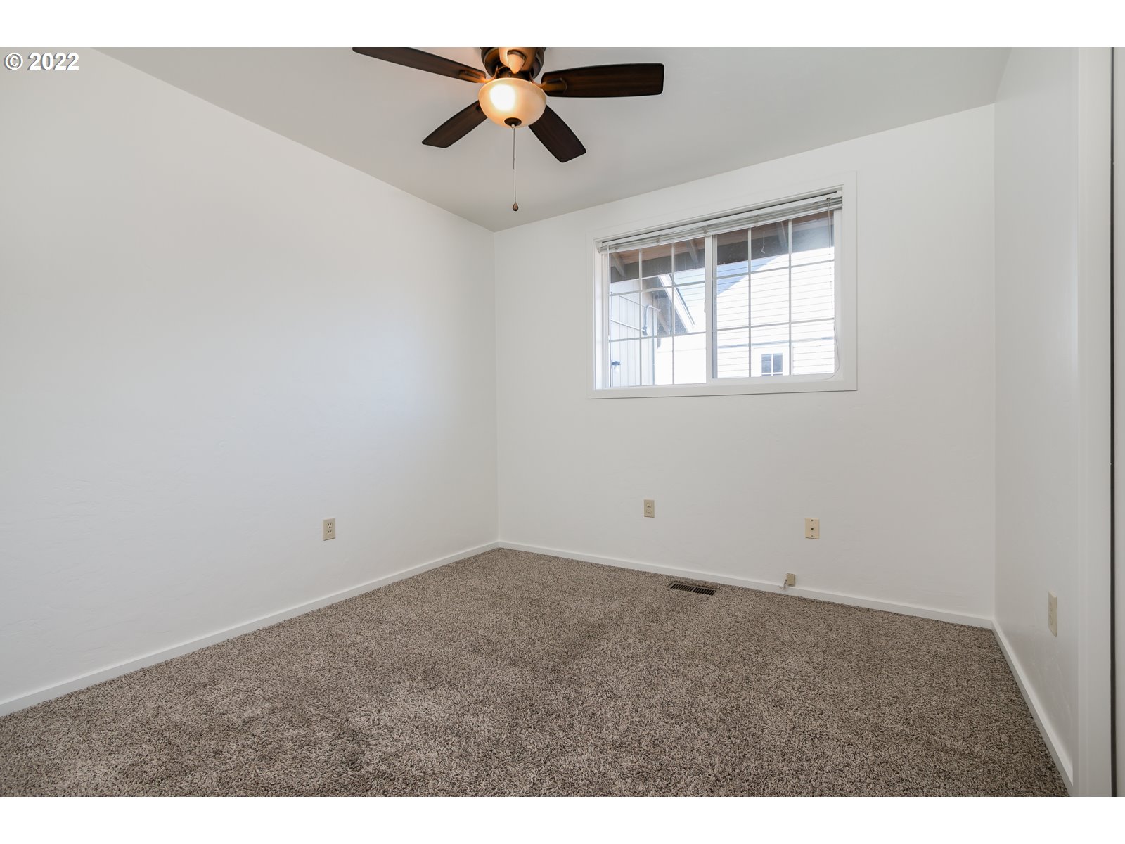 2491 Mangan Street Eugene, OR 97402 - Photo 16 of 20 a view of an empty room and window