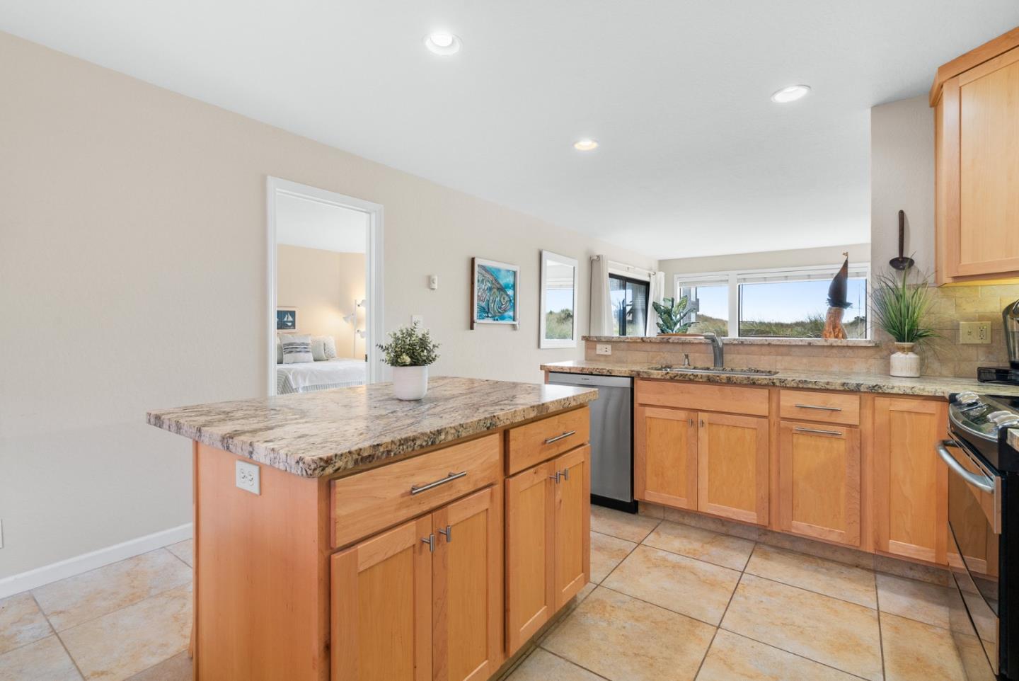 101 Shell Road, Unit 171 Watsonville, CA 95076 - Photo 12 of 31 a kitchen with stainless steel appliances granite countertop a sink and cabinets