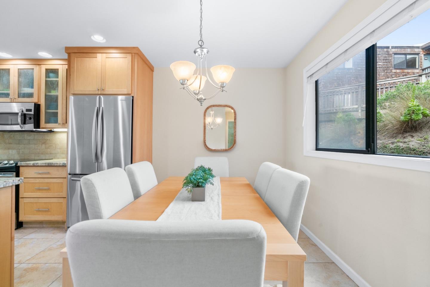 101 Shell Road, Unit 171 Watsonville, CA 95076 - Photo 16 of 31 a living room with furniture chandelier and a window