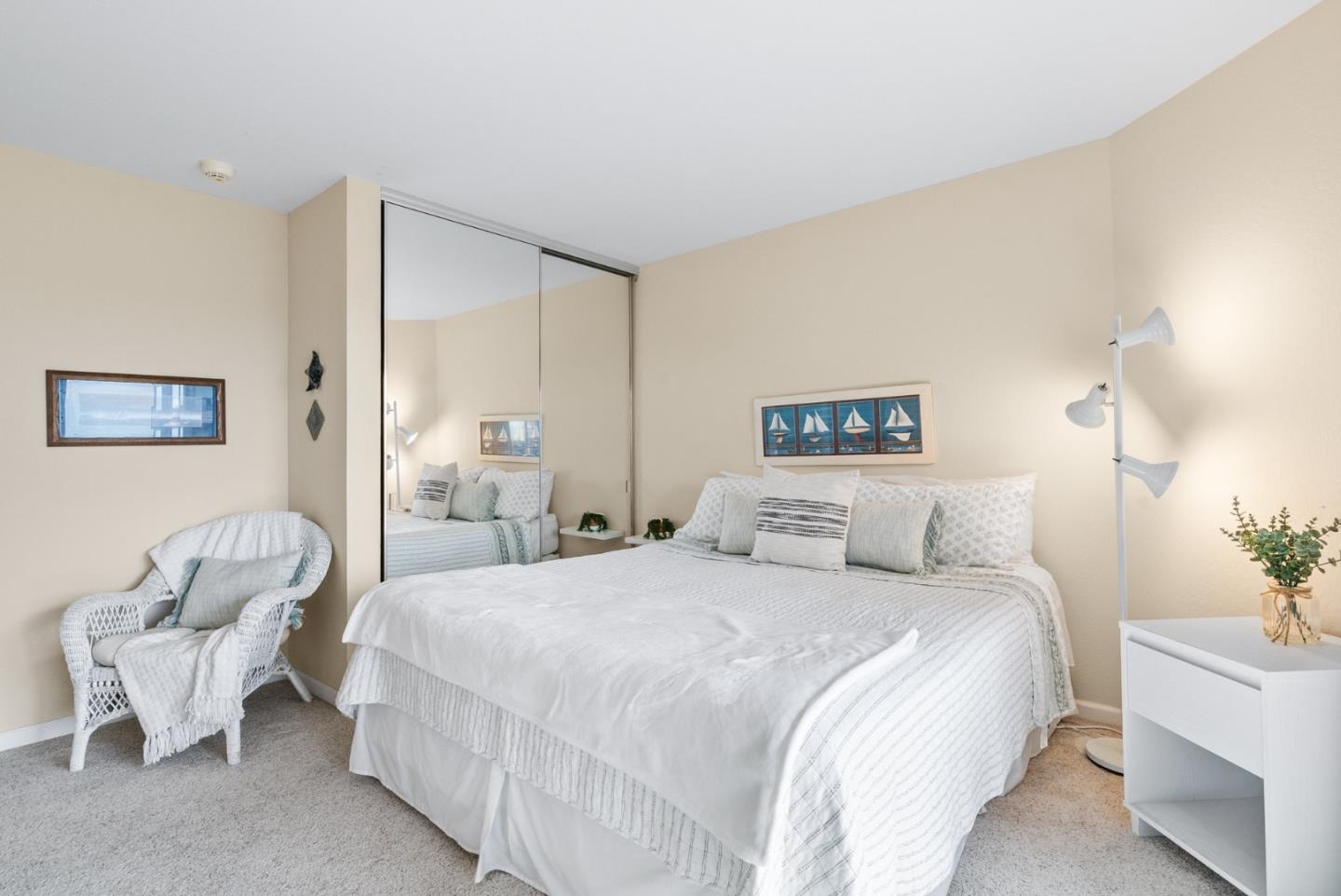 101 Shell Road, Unit 171 Watsonville, CA 95076 - Photo 23 of 31 a bedroom with a bed and a chair