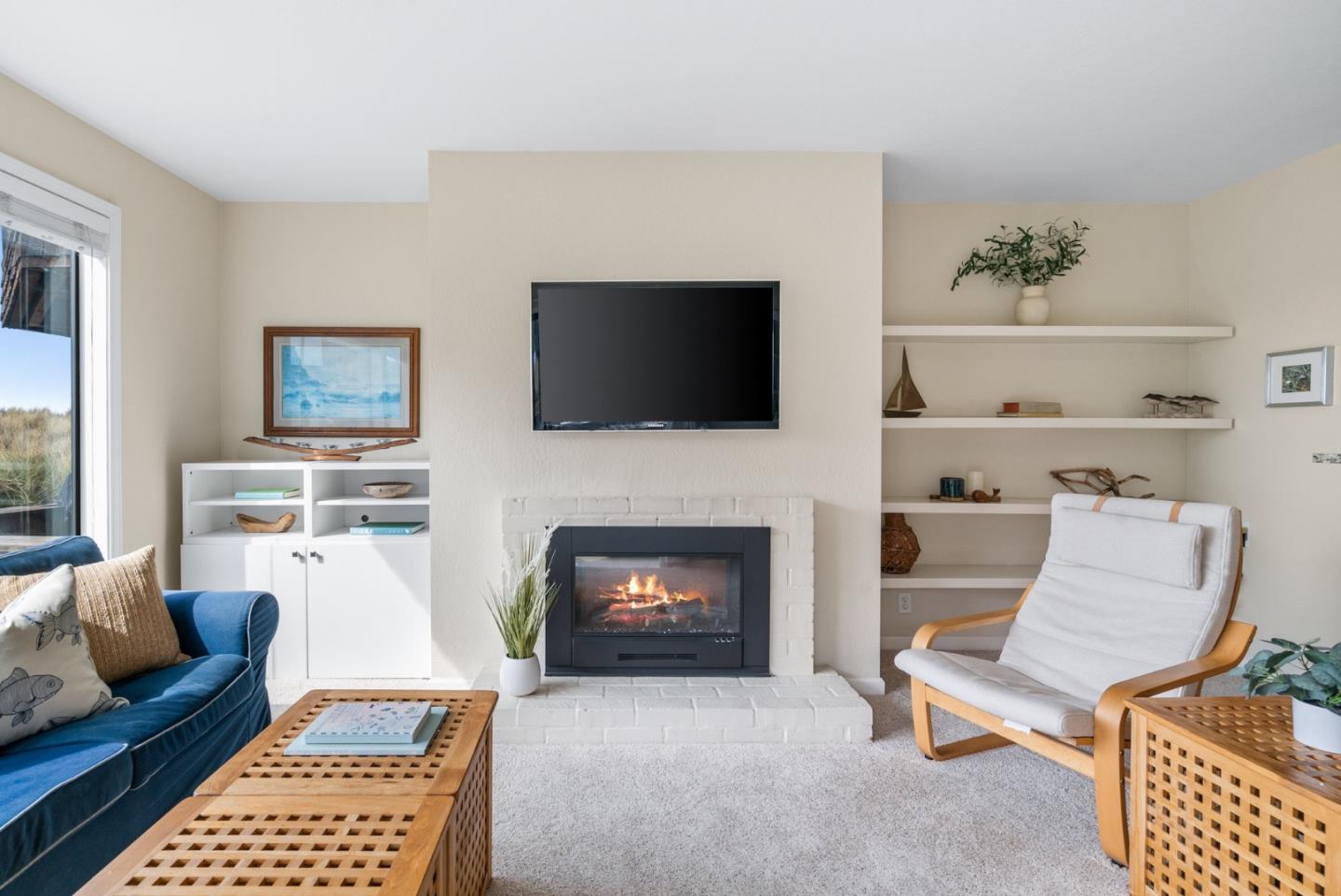 101 Shell Road, Unit 171 Watsonville, CA 95076 - Photo 6 of 31 a living room with furniture and a fireplace