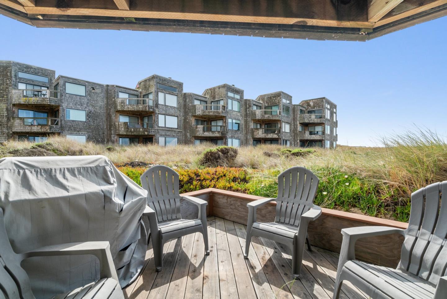 101 Shell Road, Unit 171 Watsonville, CA 95076 - Photo 8 of 31 a view of a chairs and table in the balcony