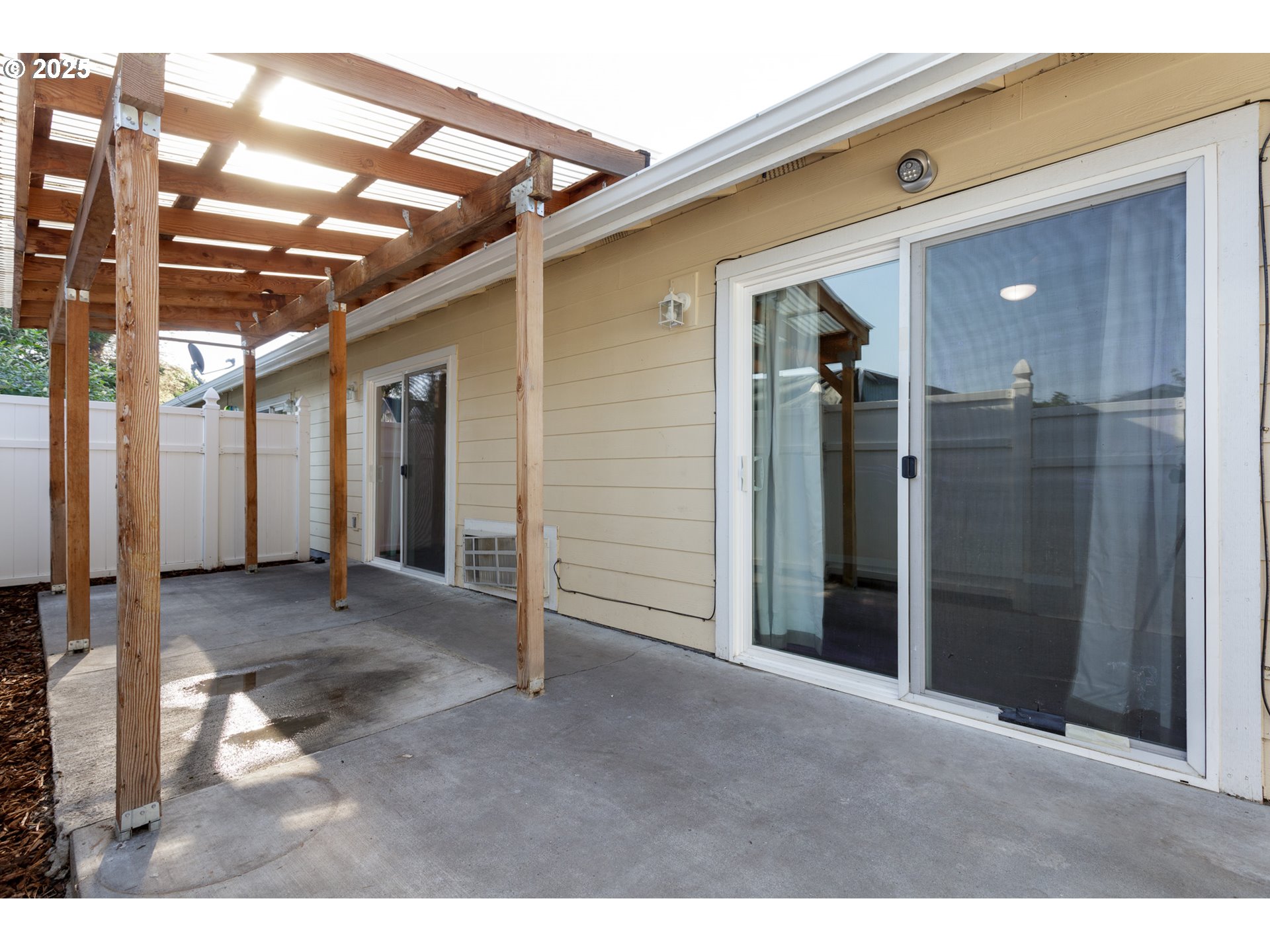 1016 Clark Street The Dalles, OR 97058 - Photo 21 of 24 a view of a hallway with wooden walls