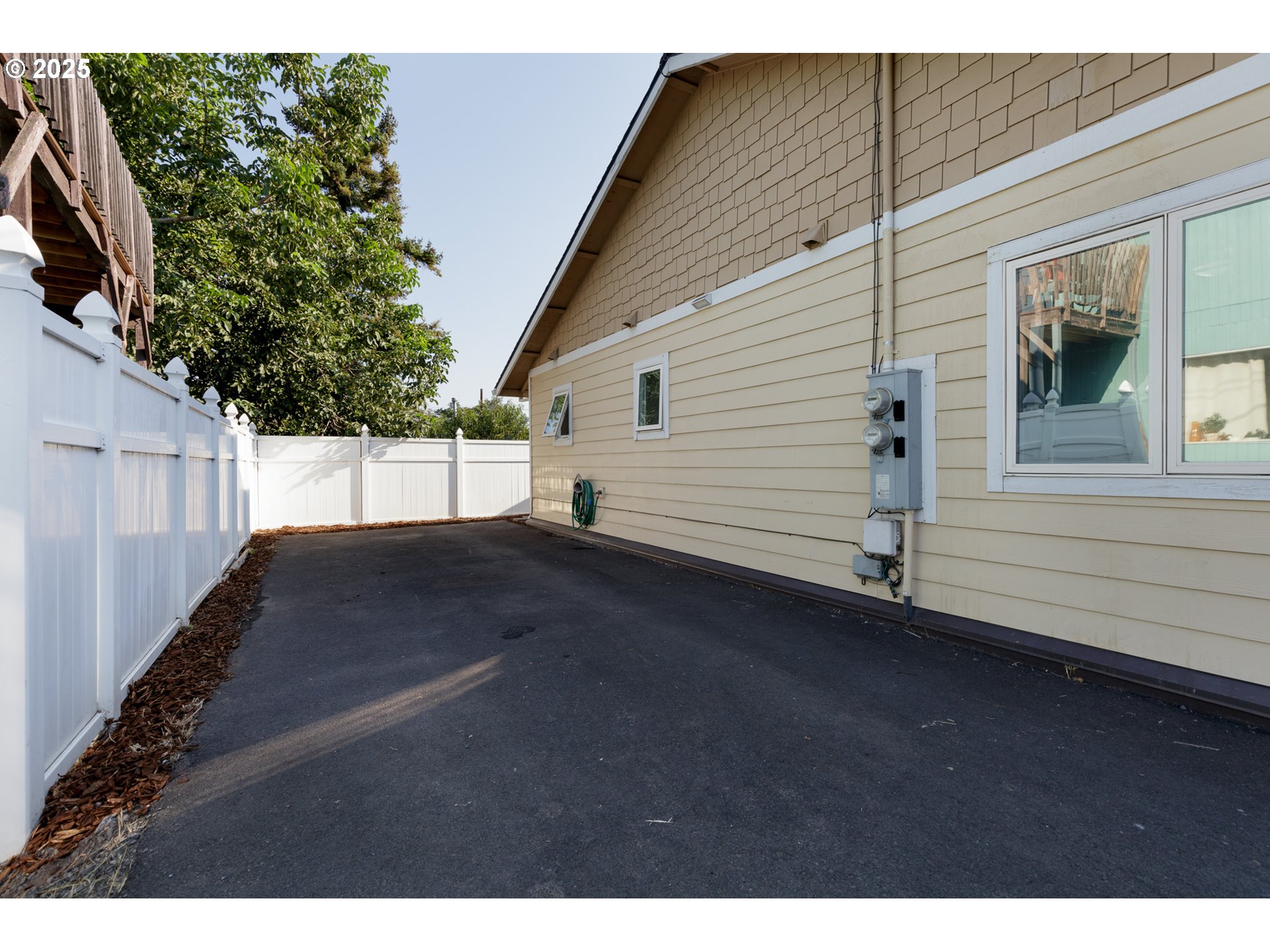 1016 Clark Street The Dalles, OR 97058 - Photo 23 of 24 a view of a house with a backyard