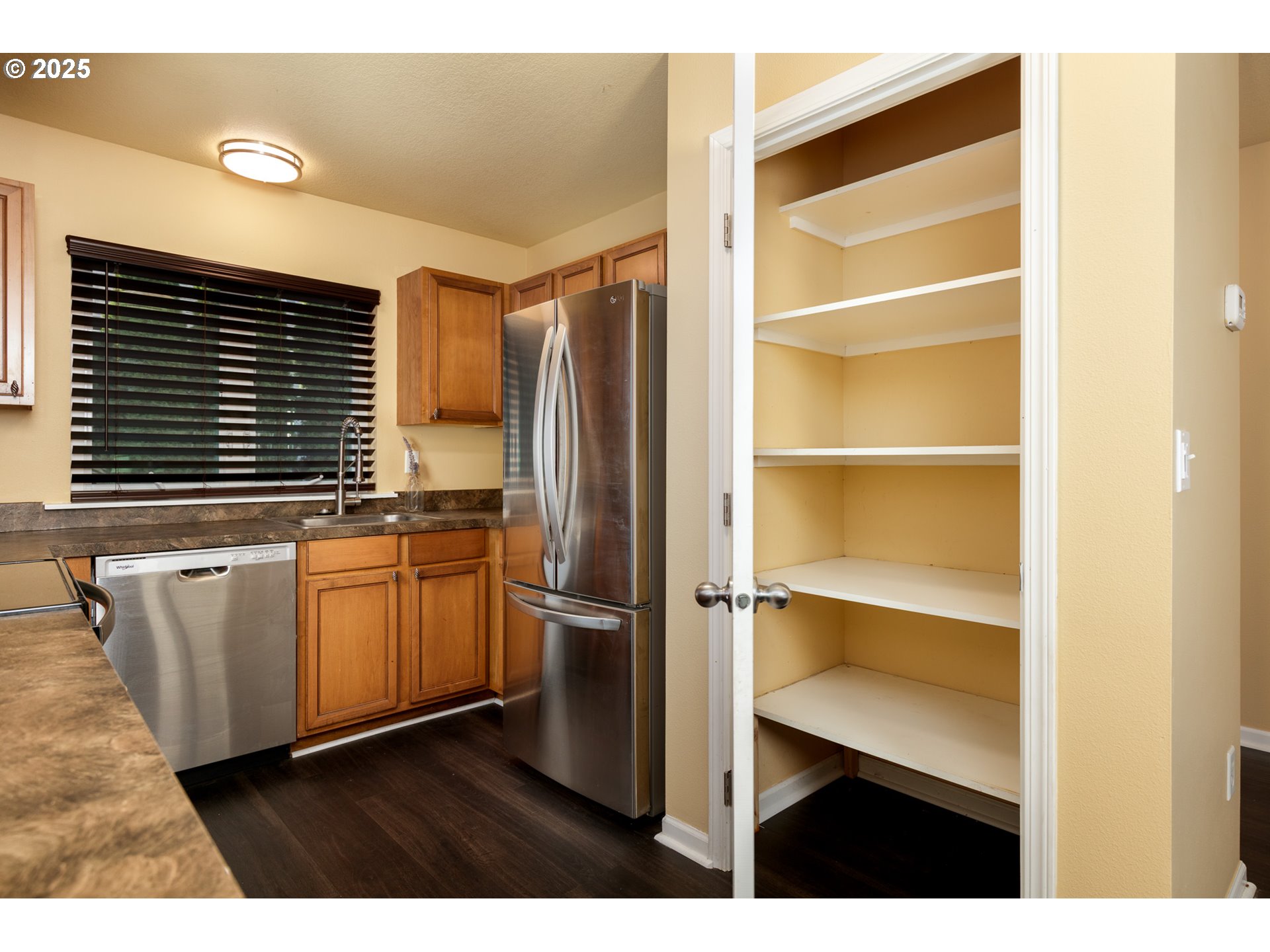 1016 Clark Street The Dalles, OR 97058 - Photo 8 of 24 a kitchen with appliances and window