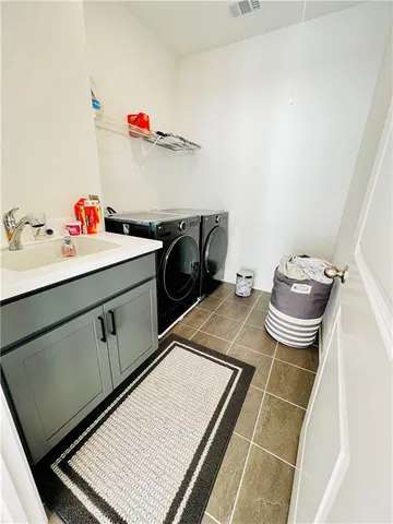 a bathroom with a sink and a vanity