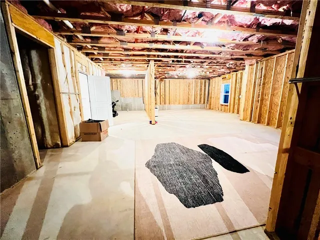 a bedroom with a bed and a walk in closet