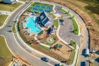 an aerial view of a swimming pool