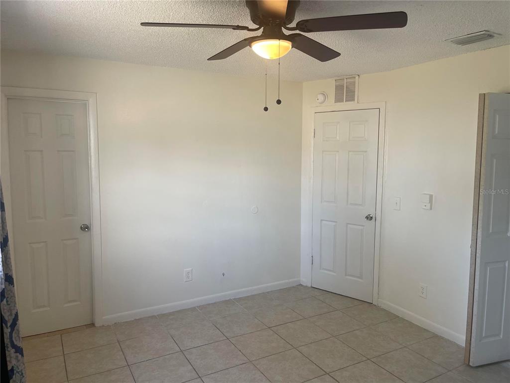 6410 Moss Way Tampa, FL 33625 - Photo 11 of 11 a view of an empty room with a fan