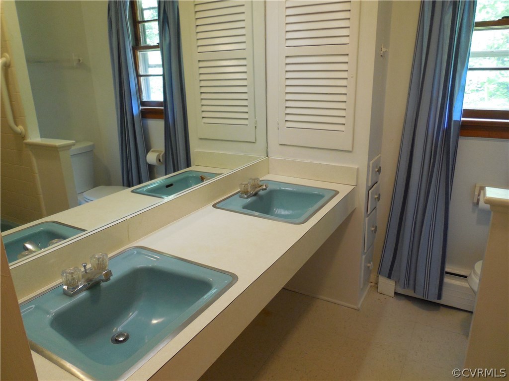 3920 Newbys Bridge Road Richmond, VA 23235 - Photo 24 of 41 Hall Bath - built-in medicine cabinets and drawers