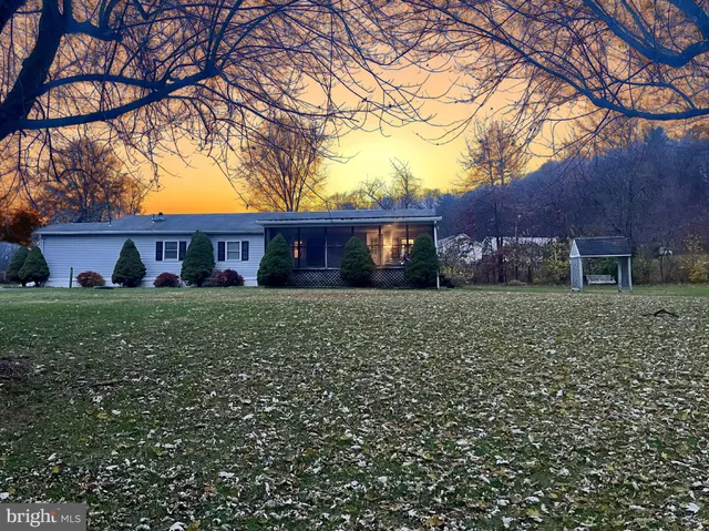 front view of house with a yard