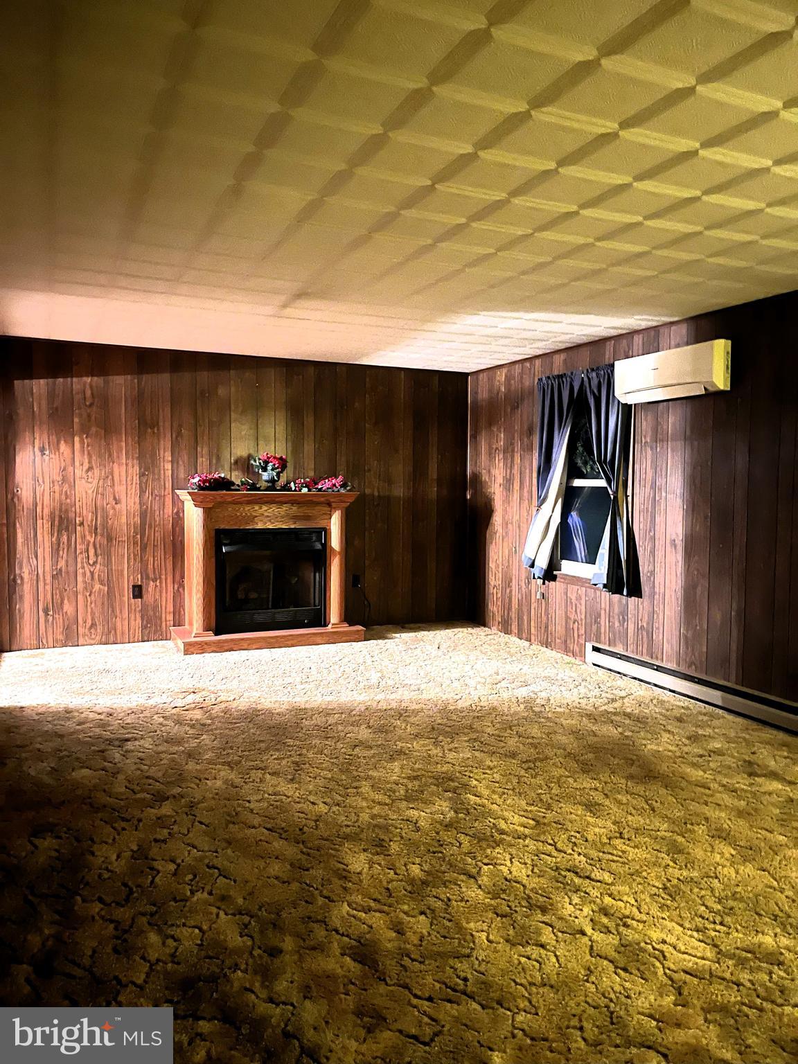 512 Brosius Hill Road Mount Pleasant Mills, PA 17853 - Photo 15 of 59 a view of empty room with a fireplace