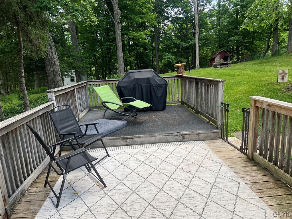 4982 Aitchison Road Onondaga, NY 13215 - Photo 24 of 26 Have a seat on the deck, relax and listen to the b