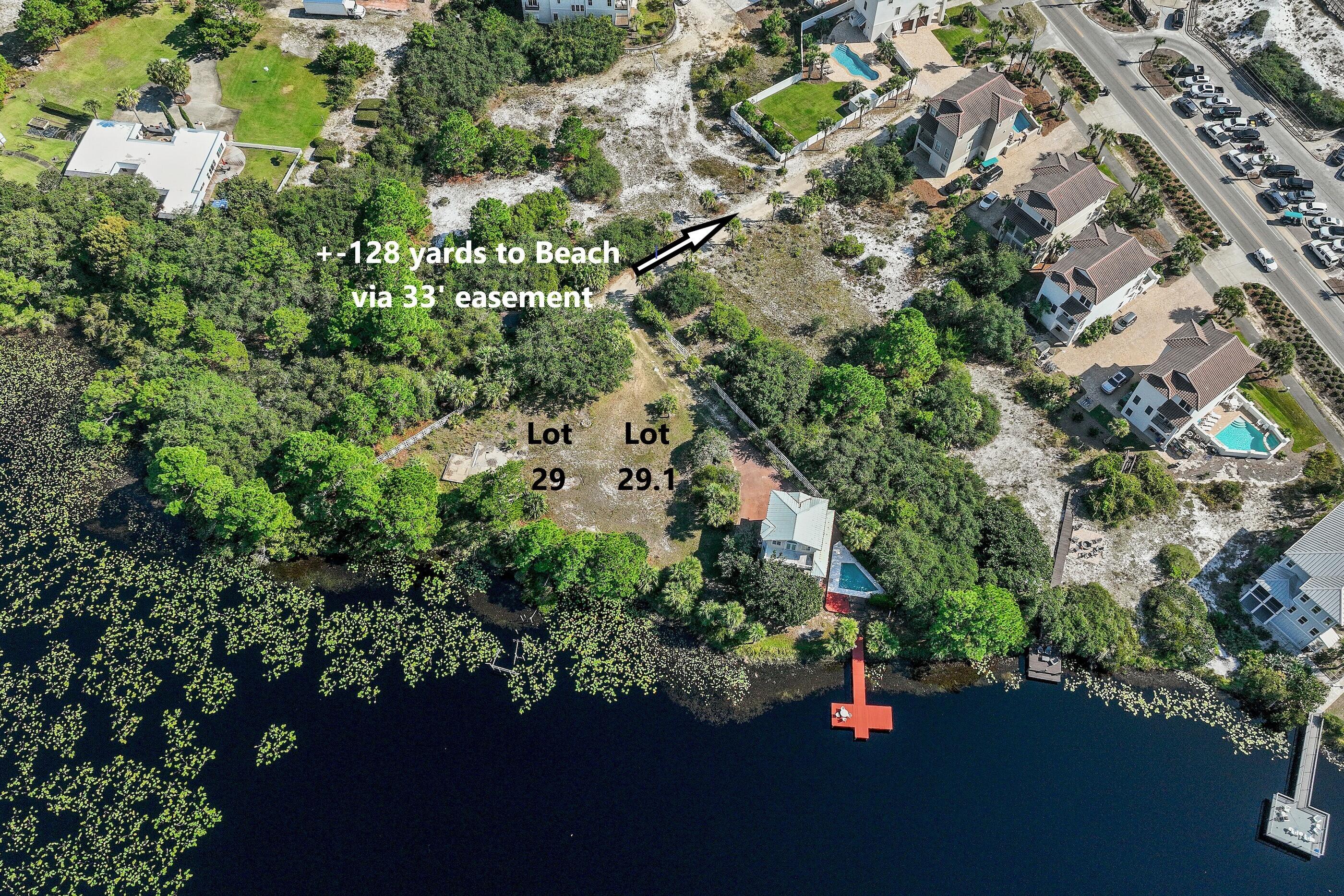 5750 West County Highway 30A Santa Rosa Beach, FL 32459 - Photo 4 of 6 an aerial view of a houses with yard