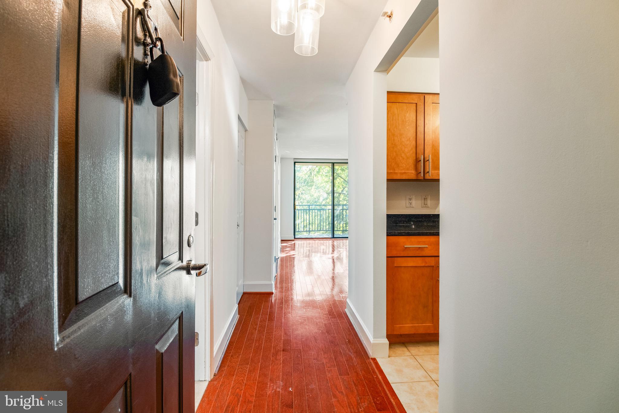 3401 38th Street Northwest, Unit 324 Washington, DC 20016 - Photo 3 of 23 a view of a bathroom from a hallway