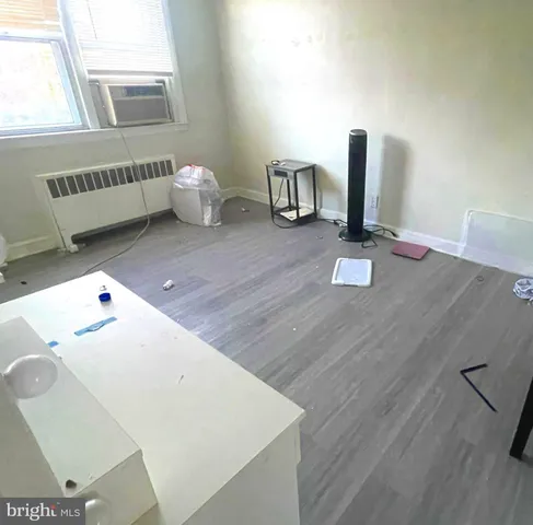 a workspace with furniture and window