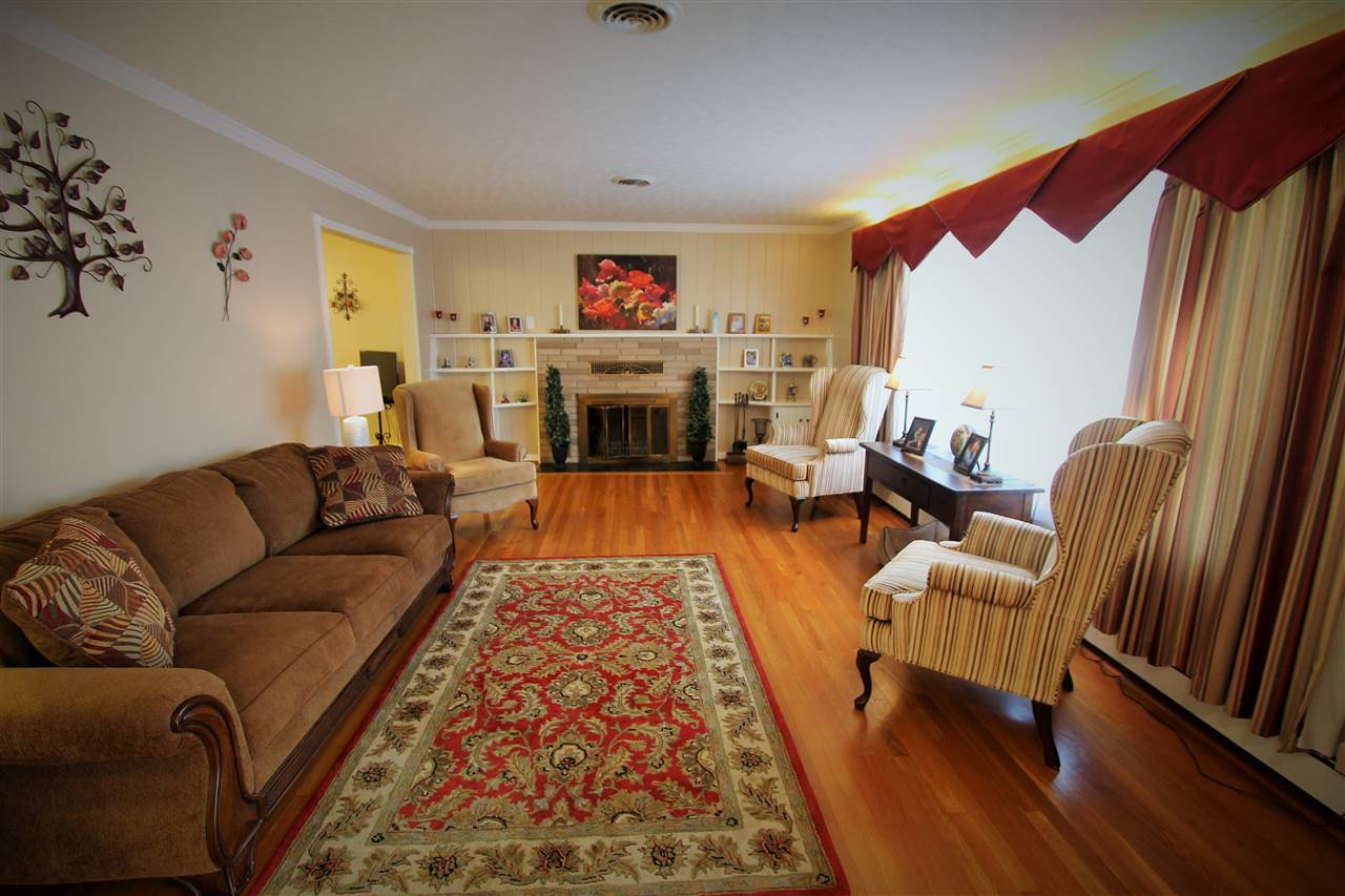 95 Cattle Scales Road Waynesboro, VA 22980 - Photo 16 of 50 a living room with furniture or couch and a fireplace