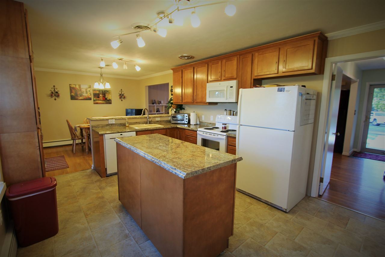 95 Cattle Scales Road Waynesboro, VA 22980 - Photo 32 of 50 a kitchen with cabinets and refrigerator