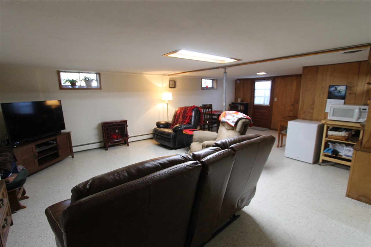 95 Cattle Scales Road Waynesboro, VA 22980 - Photo 42 of 50 a living room with furniture and a flat screen tv