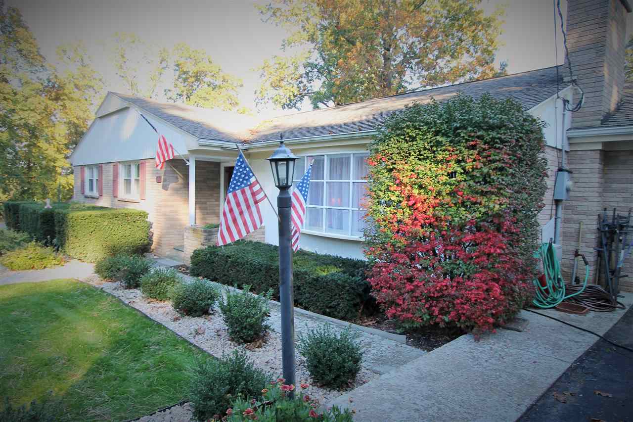 95 Cattle Scales Road Waynesboro, VA 22980 - Photo 5 of 50 a front view of a house with a yard and potted plants